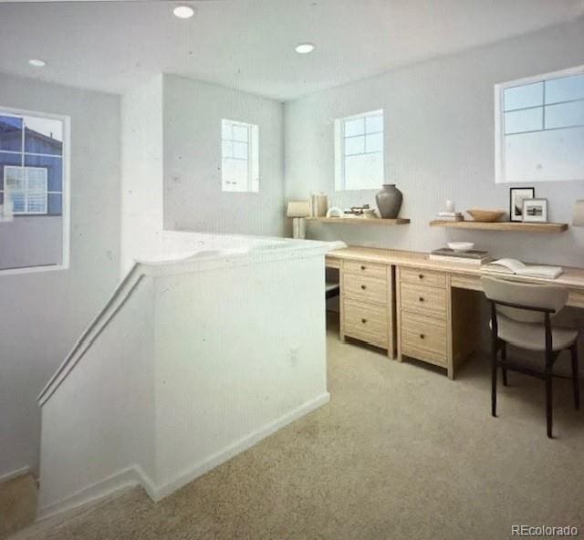 office area with recessed lighting and light colored carpet