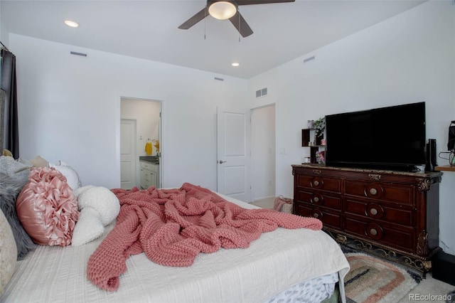 bedroom with ensuite bath, visible vents, a ceiling fan, and recessed lighting