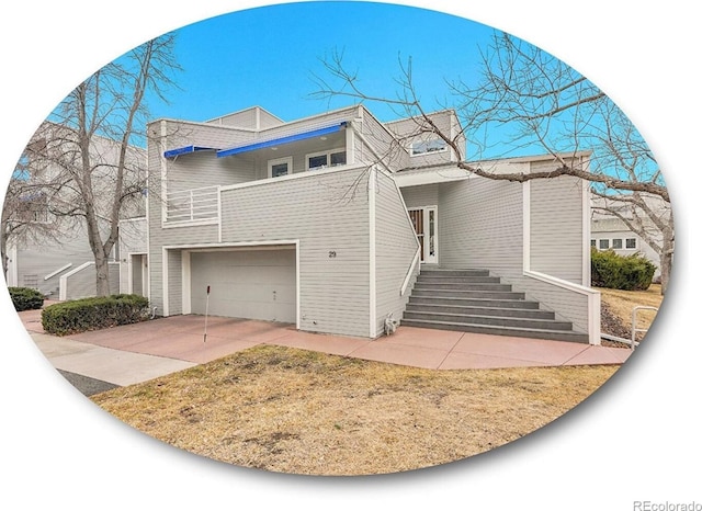 view of front of home featuring driveway and an attached garage