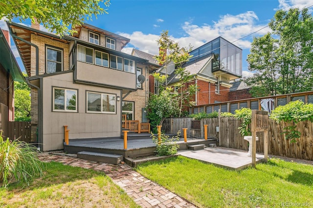 1451 N Gilpin St, Denver, CO 80218 - back of property with a patio area and a deck