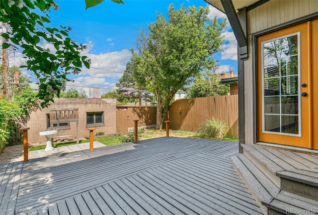 1451 N Gilpin St, Denver, CO 80218 - wooden terrace with a fenced backyard and an outbuilding