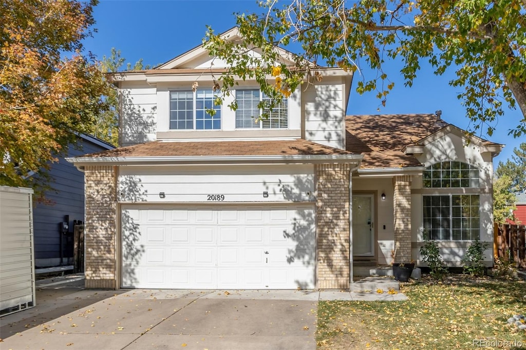 front of property featuring a garage