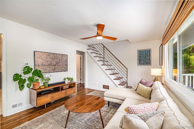 2535 S Julian St, Denver, CO 80219 - living area with wood finished floors, stairway, baseboards, and a ceiling fan