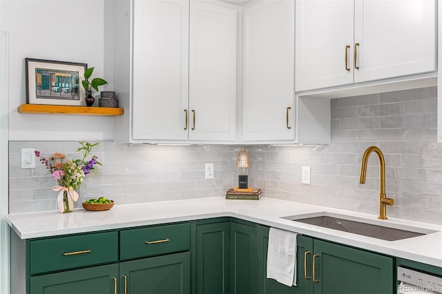 2535 S Julian St, Denver, CO 80219 - kitchen with green cabinetry, a sink, white cabinets, and dishwasher