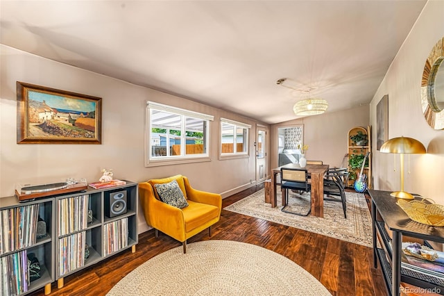 2535 S Julian St, Denver, CO 80219 - sitting room with dark wood-style floors and baseboards