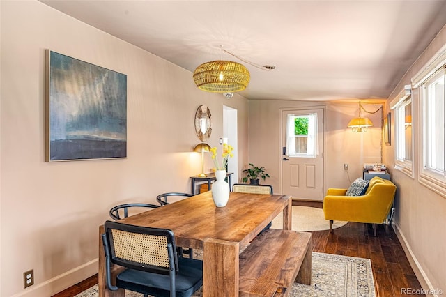 2535 S Julian St, Denver, CO 80219 - dining space featuring baseboards and dark wood-style flooring