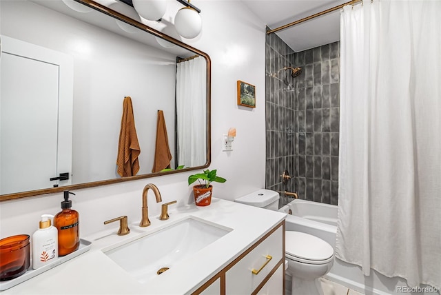 2535 S Julian St, Denver, CO 80219 - bathroom featuring vanity, toilet, and shower / tub combo