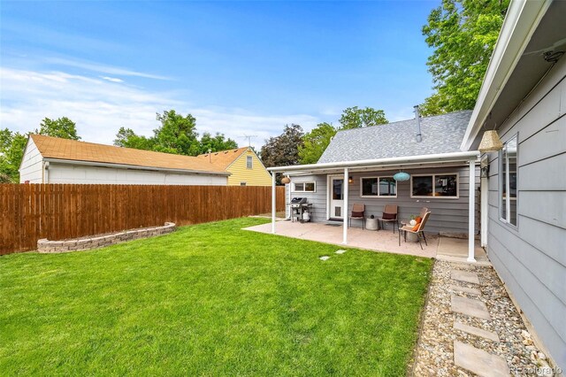 2535 S Julian St, Denver, CO 80219 - view of yard featuring a patio