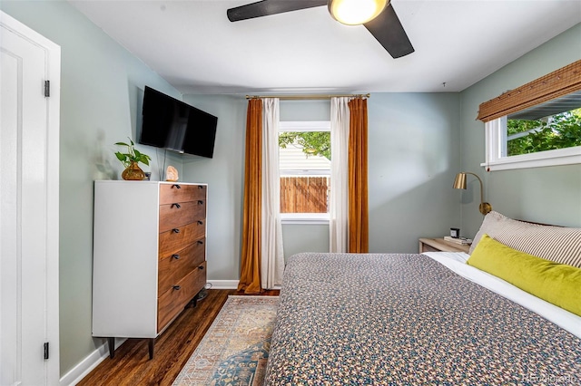 2535 S Julian St, Denver, CO 80219 - bedroom featuring dark wood-style flooring, baseboards, and a ceiling fan