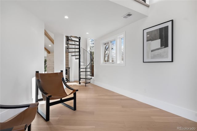 hall featuring light hardwood / wood-style flooring