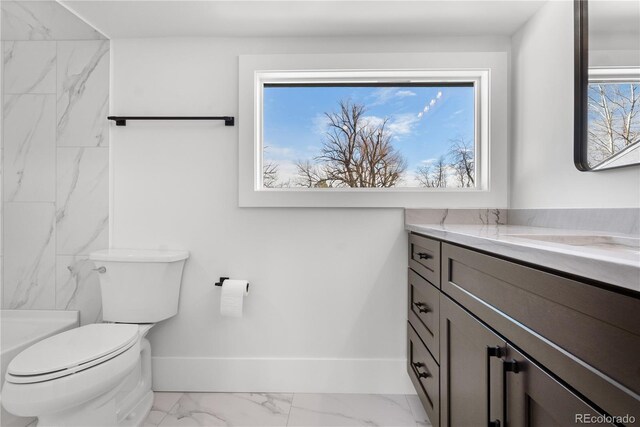 bathroom with vanity and toilet