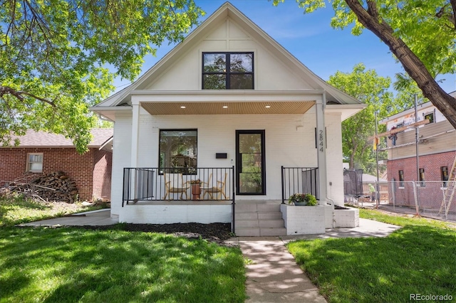 2844 Quitman St, Denver, CO 80212 - view of front of home featuring covered porch