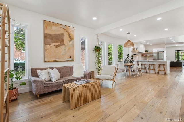 2844 Quitman St, Denver, CO 80212 - living room with light wood-style floors, healthy amount of natural light, recessed lighting, and beam ceiling