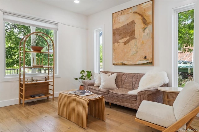 2844 Quitman St, Denver, CO 80212 - living room featuring light wood-type flooring, baseboards, and recessed lighting