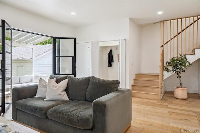 2844 Quitman St, Denver, CO 80212 - living area featuring stairway, light wood-style flooring, recessed lighting, and baseboards