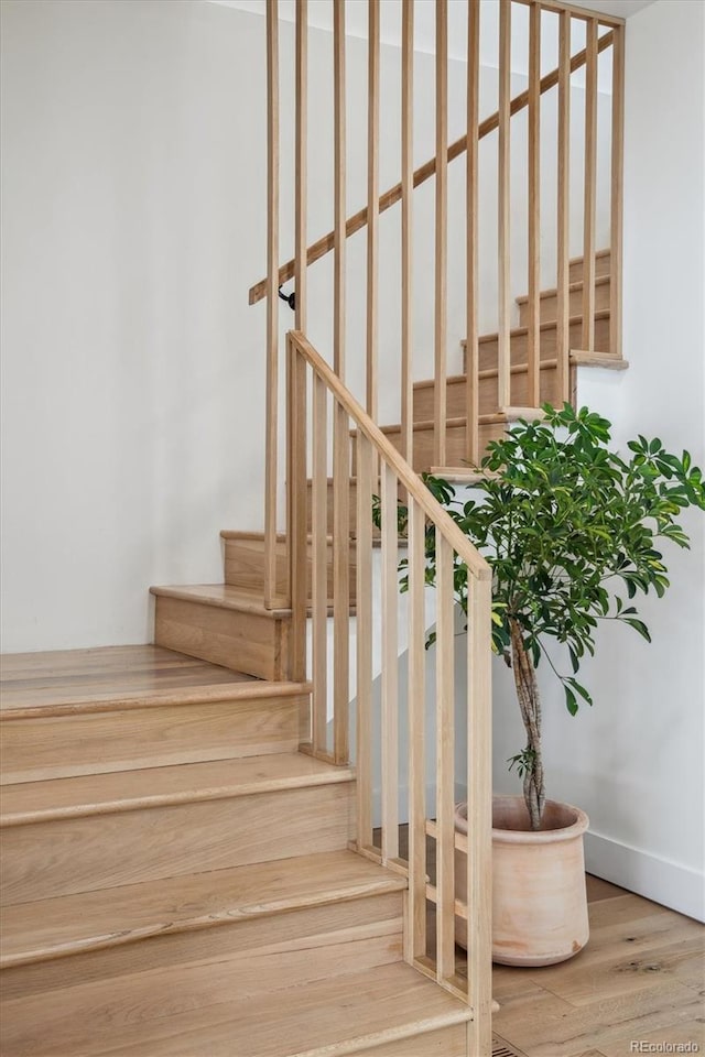 2844 Quitman St, Denver, CO 80212 - staircase with wood finished floors and baseboards