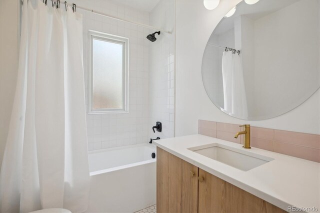 2844 Quitman St, Denver, CO 80212 - bathroom with shower / tub combo with curtain, vanity, and decorative backsplash