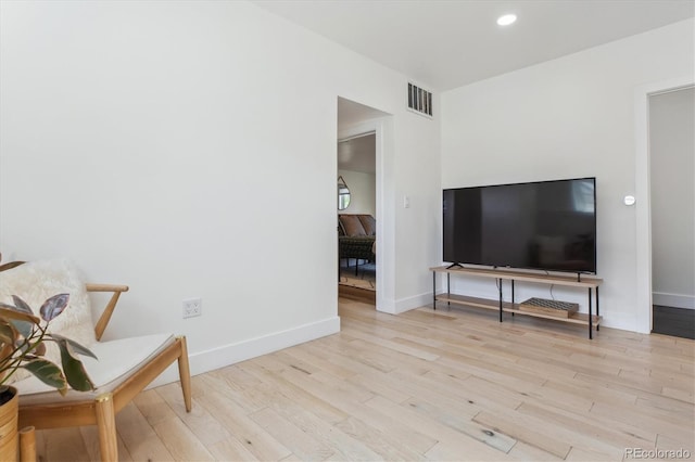 2844 Quitman St, Denver, CO 80212 - living area featuring wood finished floors, baseboards, and recessed lighting