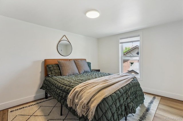 2844 Quitman St, Denver, CO 80212 - bedroom with baseboards and wood finished floors