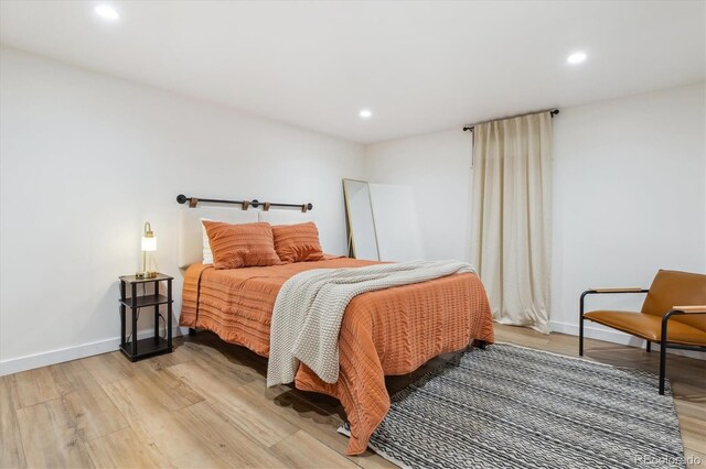 2844 Quitman St, Denver, CO 80212 - bedroom featuring light wood-type flooring, recessed lighting, and baseboards