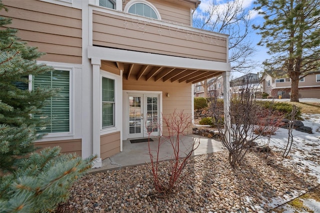 view of side of home featuring a patio