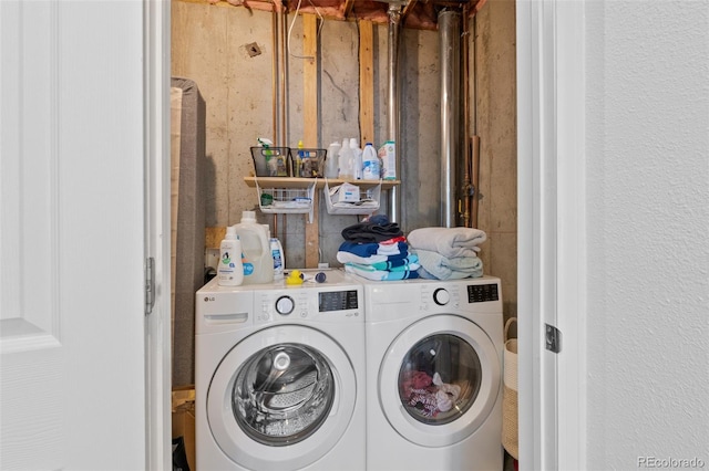 washroom with independent washer and dryer