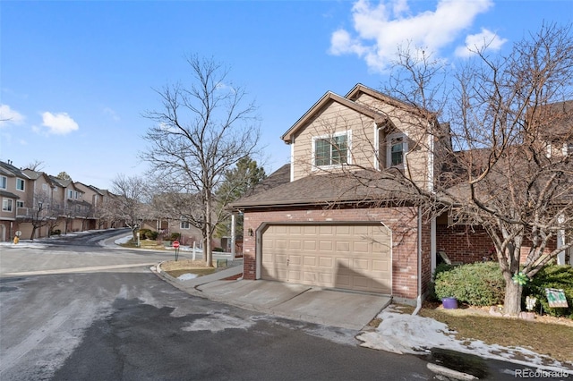 view of side of property featuring a garage