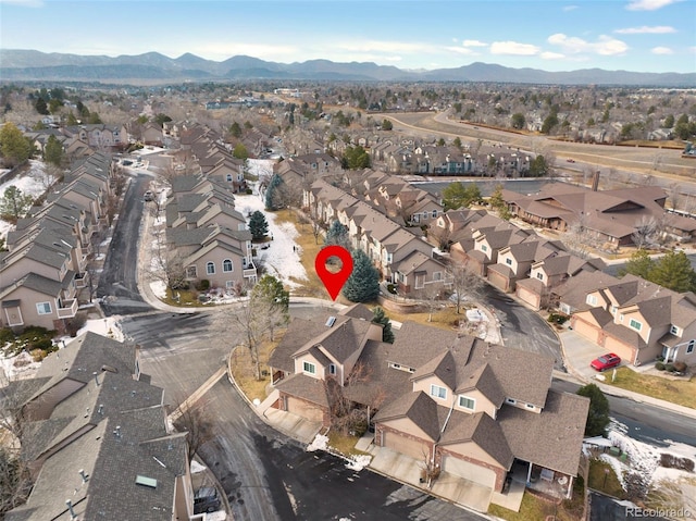 birds eye view of property featuring a mountain view