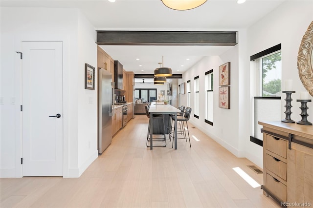 2702 Lowell Blvd, Denver, CO 80211 - dining space with plenty of natural light, recessed lighting, and baseboards
