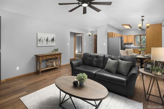 32252 Steven Way, Conifer, CO 80433 - living area with a ceiling fan, wood finished floors, and vaulted ceiling