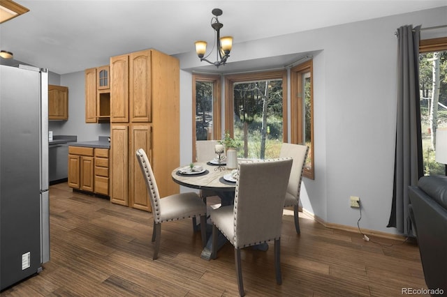 32252 Steven Way, Conifer, CO 80433 - dining area with a chandelier and dark wood-style floors