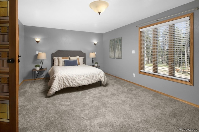 32252 Steven Way, Conifer, CO 80433 - carpeted bedroom featuring multiple windows