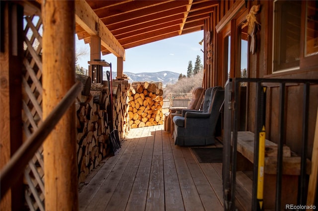 wooden terrace featuring a mountain view