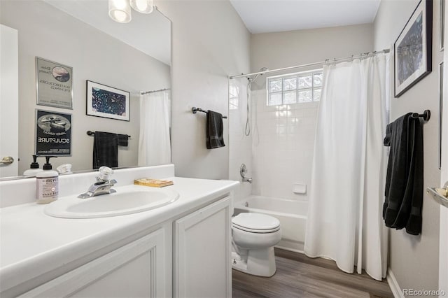 9747 W Peakview Dr, Littleton, CO 80123 - full bathroom with vanity, wood finished floors, and shower / bathtub combination with curtain