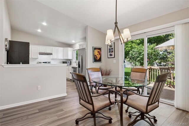 9747 W Peakview Dr, Littleton, CO 80123 - dining area with light wood-style floors, lofted ceiling, and recessed lighting