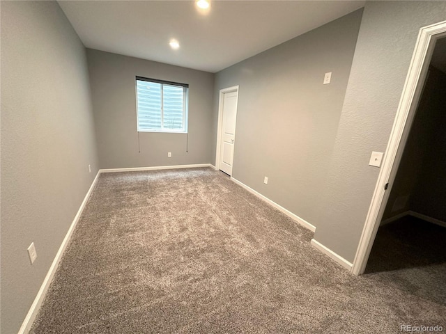 9482 Kendrick Way, Arvada, CO 80007 - spare room with carpet and recessed lighting