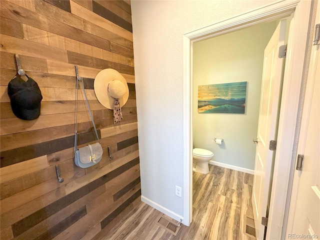 9482 Kendrick Way, Arvada, CO 80007 - bathroom with wood finished floors and wood walls
