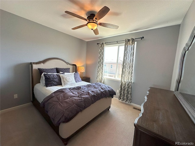 9482 Kendrick Way, Arvada, CO 80007 - bedroom featuring light carpet and ceiling fan