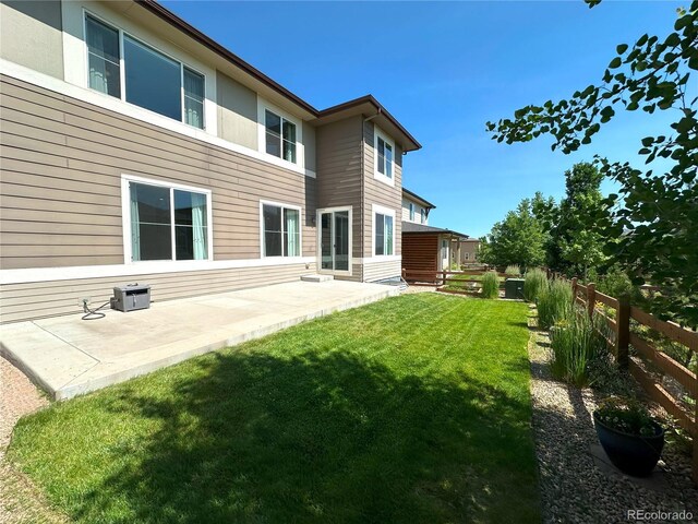 9482 Kendrick Way, Arvada, CO 80007 - back of property featuring a patio area