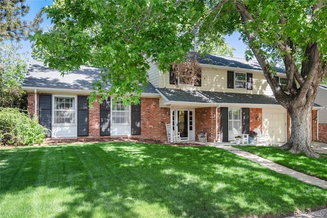 6624 S Sycamore St, Littleton, CO 80120 - traditional-style home with brick siding and a front yard