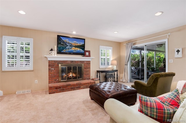 6624 S Sycamore St, Littleton, CO 80120 - carpeted living room with recessed lighting and a fireplace