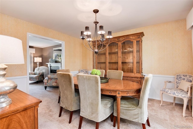 6624 S Sycamore St, Littleton, CO 80120 - dining area with a chandelier and light carpet
