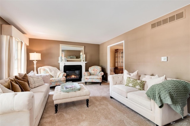 6624 S Sycamore St, Littleton, CO 80120 - living area featuring carpet floors and a glass covered fireplace