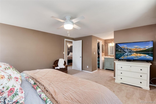 6624 S Sycamore St, Littleton, CO 80120 - bedroom with light colored carpet, baseboards, ceiling fan, and ensuite bath