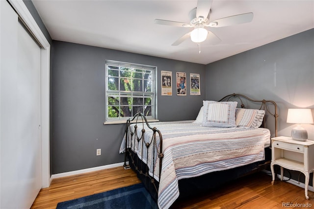 6624 S Sycamore St, Littleton, CO 80120 - bedroom featuring wood finished floors, a ceiling fan, baseboards, and a closet
