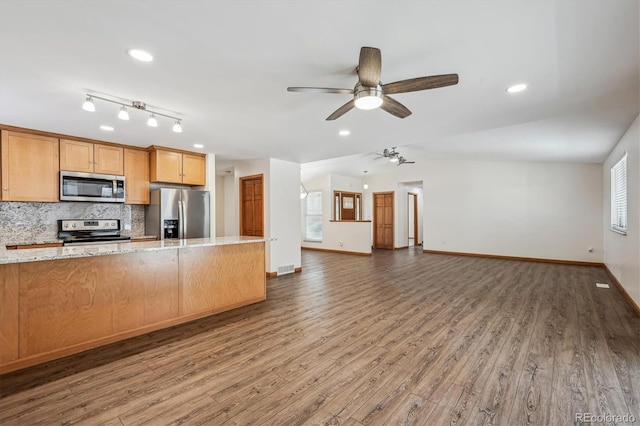 1843 S Pierson Ct, Lakewood, CO 80232 - kitchen featuring stainless steel appliances, a ceiling fan, open floor plan, decorative backsplash, and recessed lighting