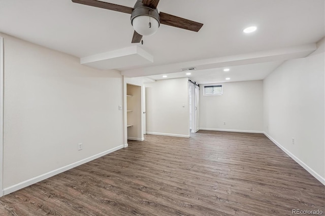 1843 S Pierson Ct, Lakewood, CO 80232 - basement with wood finished floors, ceiling fan, and recessed lighting