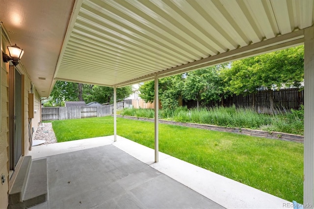 1843 S Pierson Ct, Lakewood, CO 80232 - fenced backyard with a patio