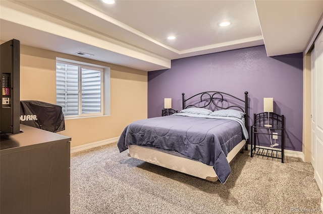carpeted bedroom with baseboards, recessed lighting, and visible vents