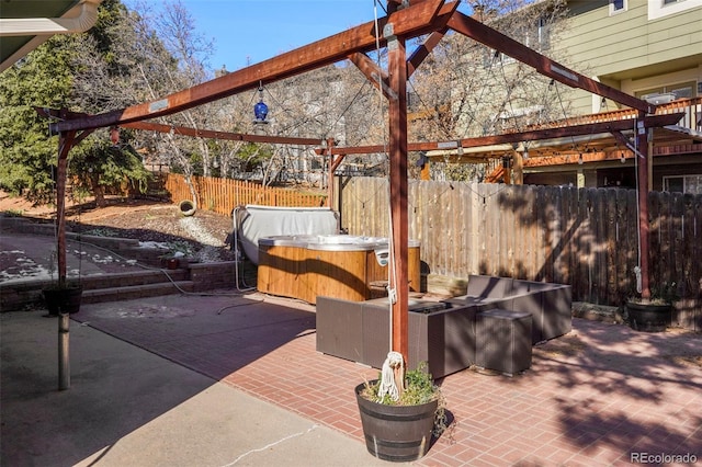 view of patio featuring a hot tub